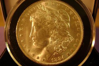 1884 - O Morgan Silver Dollar - This Coin Is In Brilliant Uncirculated photo