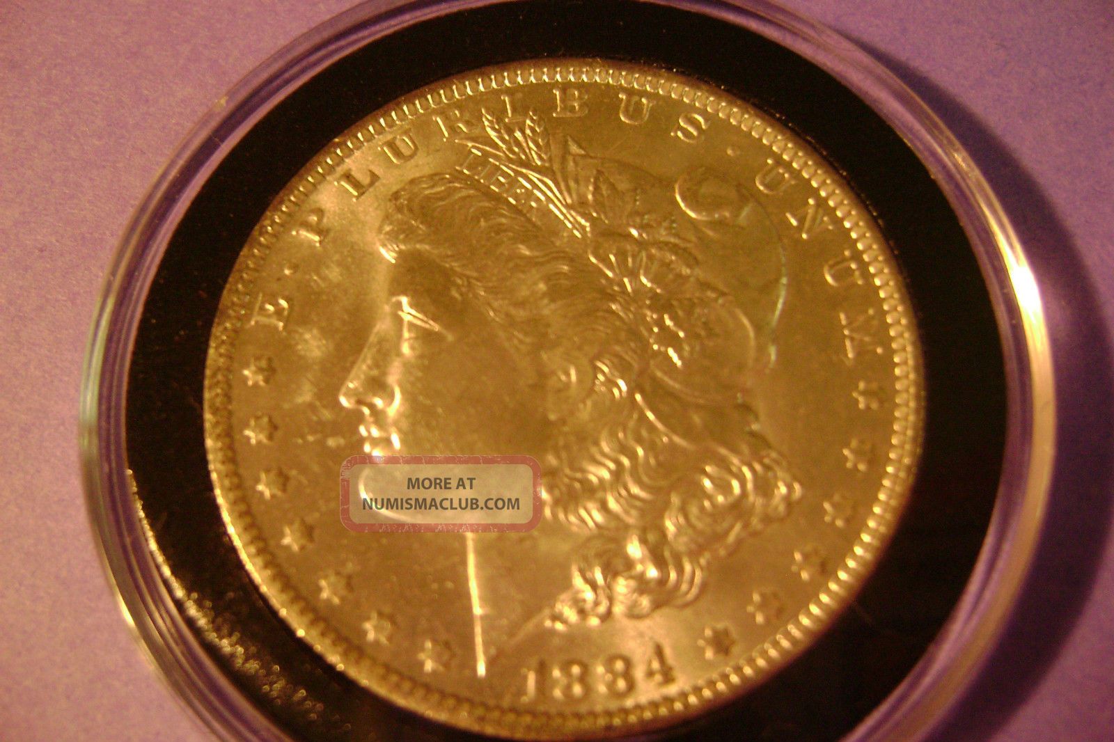 1884 - O Morgan Silver Dollar - This Coin Is In Brilliant Uncirculated