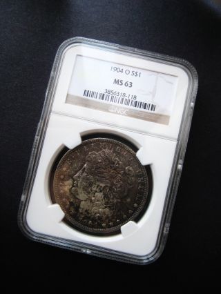 1904 O Morgan Silver Dollar Choice Unc Bu Toned Coin Ngc Ms 63 photo