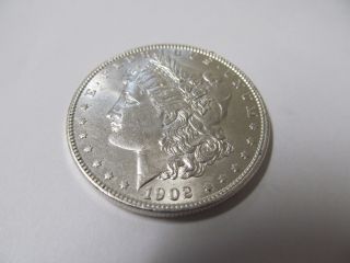 Uncirculated 1902 - O Silver Morgan Dollar S/h photo