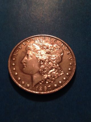 1897,  Morgan Dollar.  90% Silver photo