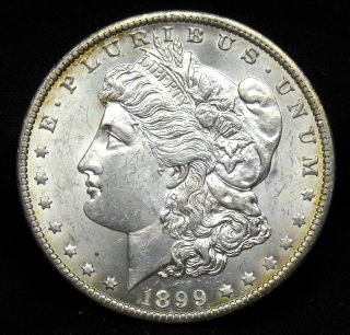 1899 O Morgan Silver Dollar Grade Ch Bu B354 photo