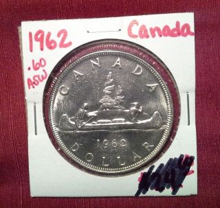 1962 Uncirculated Silver Canadian Loonie Dollar Coin.  60 Asw photo