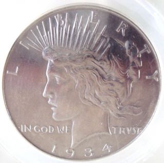 1934 - D Peace Silver Dollar Coin Graded Anacs Ms60 Cleaned photo