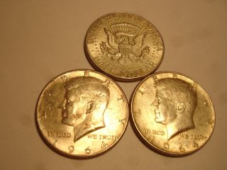 Three - - 90 % Silver 1964p Kennedy Half Dollars Circulated.  Some Toning. photo