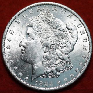 Uncirculated 1884 - O Silver Morgan Dollar S/h photo
