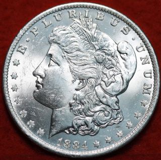 Uncirculated 1884 - O Silver Morgan Dollar S/h photo
