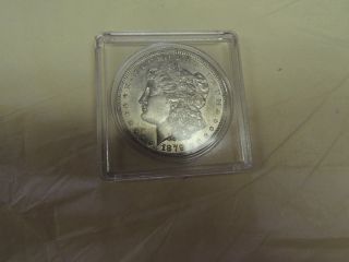 1879 Morgan Silver Dollar In A Slab Holder photo