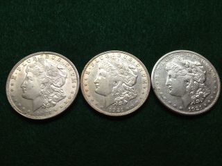 Three 1921 Morgan Silver Dollars - One 1921 - P,  One 1921 - D,  And One 1921 - S photo
