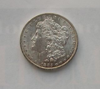 1885 - 0 Morgan Silver Dollar Brilliant White Uncirculated photo