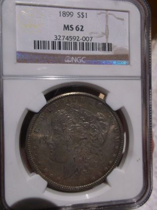 1899 Morgan Silver Dollar $1 Ngc Graded Ms 62 Greenish Tone On Both Side 3 photo