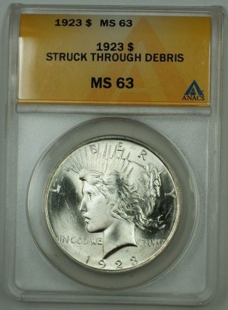 1923 Silver Peace Dollar Coin Anacs Ms - 63 Struck Through Debris Brilliant Luster photo