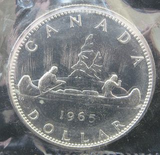 1965 Bu Proof Like Canadian.  800 Silver Dollar - Rcm Mylar Package photo
