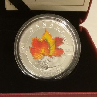 2013 Canada $10 Maple Leaf (o Canada Series 11).  9999 1/2 Oz Silver Coin photo