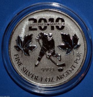 2010 1 Oz Canadian Maple Leaf Vancouver Olympic Games.  9999 Fine Silver Coin photo