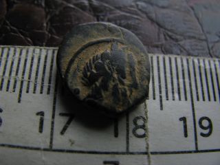 Uncleaned Ancient Coin,  Looks Celtic ???,  Unresearched,  Interesting Detail photo