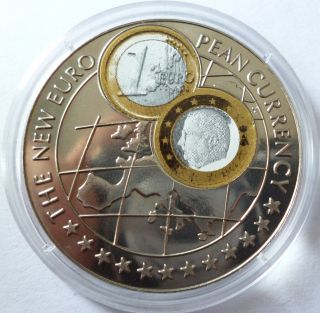 Uganda 1000 Shillings 1999 Proof The Euro Currency With Belgium 1 Euro photo