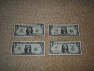 4 - 2006 Uncirculated Consecutive One Dollar Bills,  Gem Perfect photo
