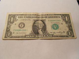 $1.  00 Frn Low Serial Number W/star F 03284100,  2006,  Graded Vf photo
