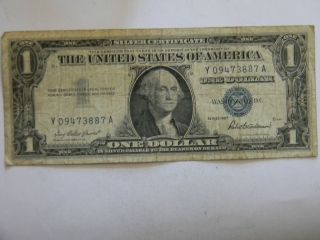 1957 One Dollar Silver Certificate Y Series Blue Seal Low Serial Note photo