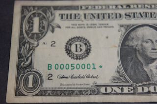 Fancy,  Repeated 2006 Us One Dollar Serial Number B00050001 photo