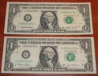 2003 $1 Chicago Star Note Uncirculated + 1993 Star Note Au photo