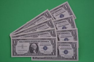Eight 1957 Consecutive & Uncirculated $1.  00 Silver Certificates photo