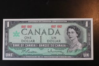 Canadian 1967 $1 Bill With Date.  The Bill Is,  Crisp & Uncirculated. photo