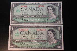 Canadian 2 1967 $1 Bills One With Date & One With Serial Crisp & Uncirculated photo