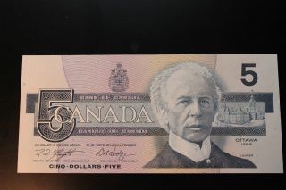 Canadian 1986 $5 Bill Bird Series.  The Bill Is,  Crisp & Uncirculated. photo