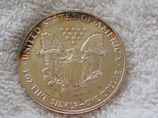 1 Troy Oz Fine Silver Dollar United States Coin 1991 Eagle Uncirculated Toned. photo