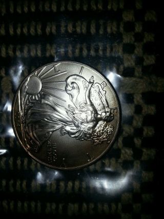 1 Silver 2014 American Eagle 1 Oz.  Coin - Tone 999 Fine Silver photo