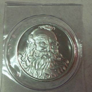 2011 Silver Round Coin.  999 Fine Silver Santa Claus Christmas 1 Oz. photo
