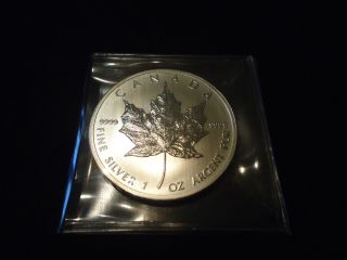 One 2012 1 Oz Silver Canadian Maple Leaf Coin photo
