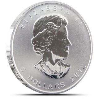 2013 1 Oz Silver Canadian Maple Leaf Coin.  9999 Fine Silver photo