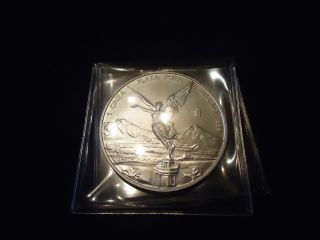 One 2012 1 Oz Silver Mexican Libertad Coin - Brilliant Uncirculated photo