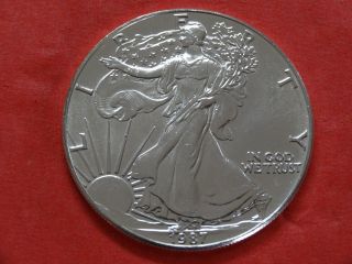1987 Unc.  American Silver Eagle Dollar photo