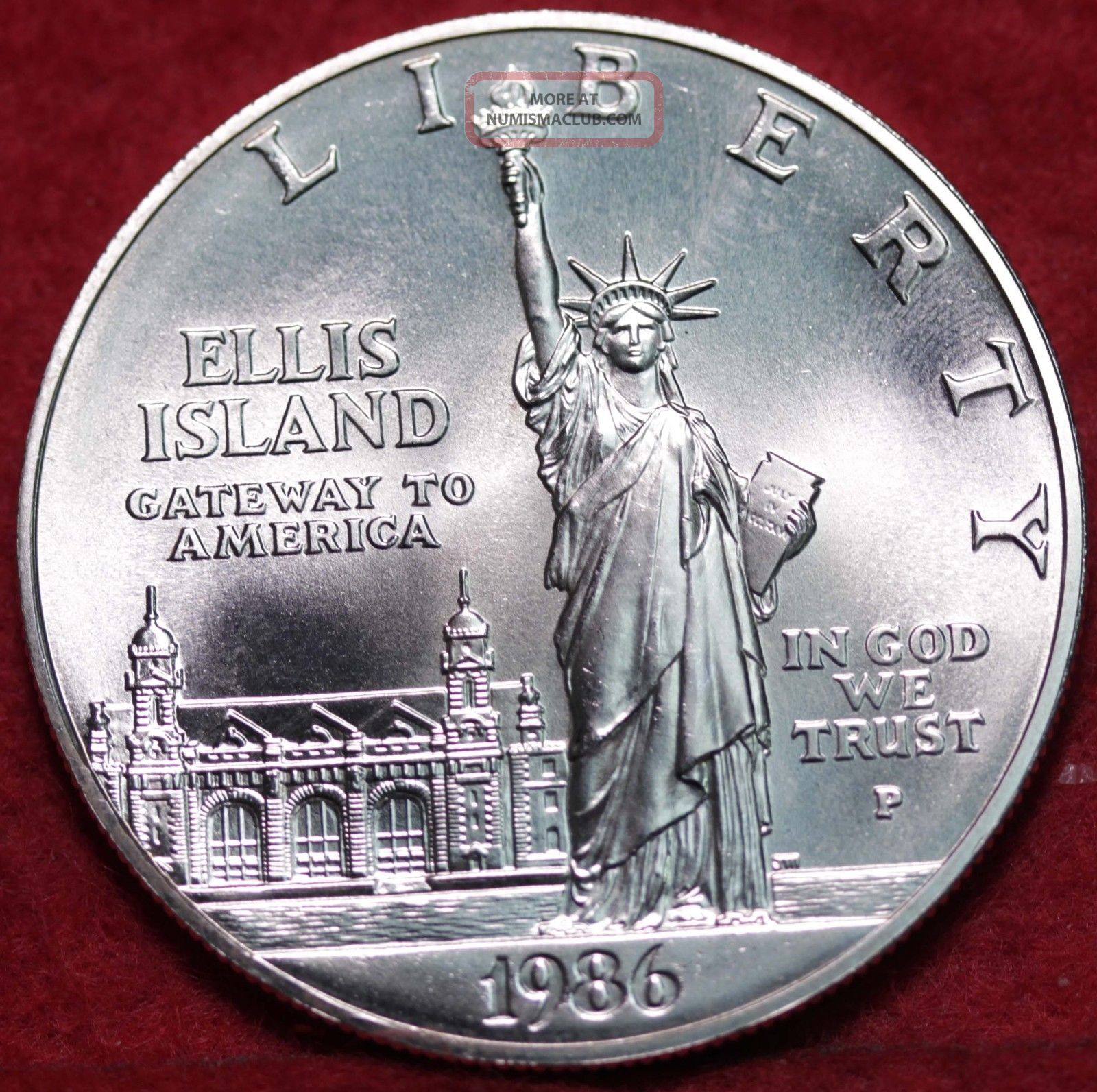 value of a 1986 proof ellis island liberty coins silver dollar