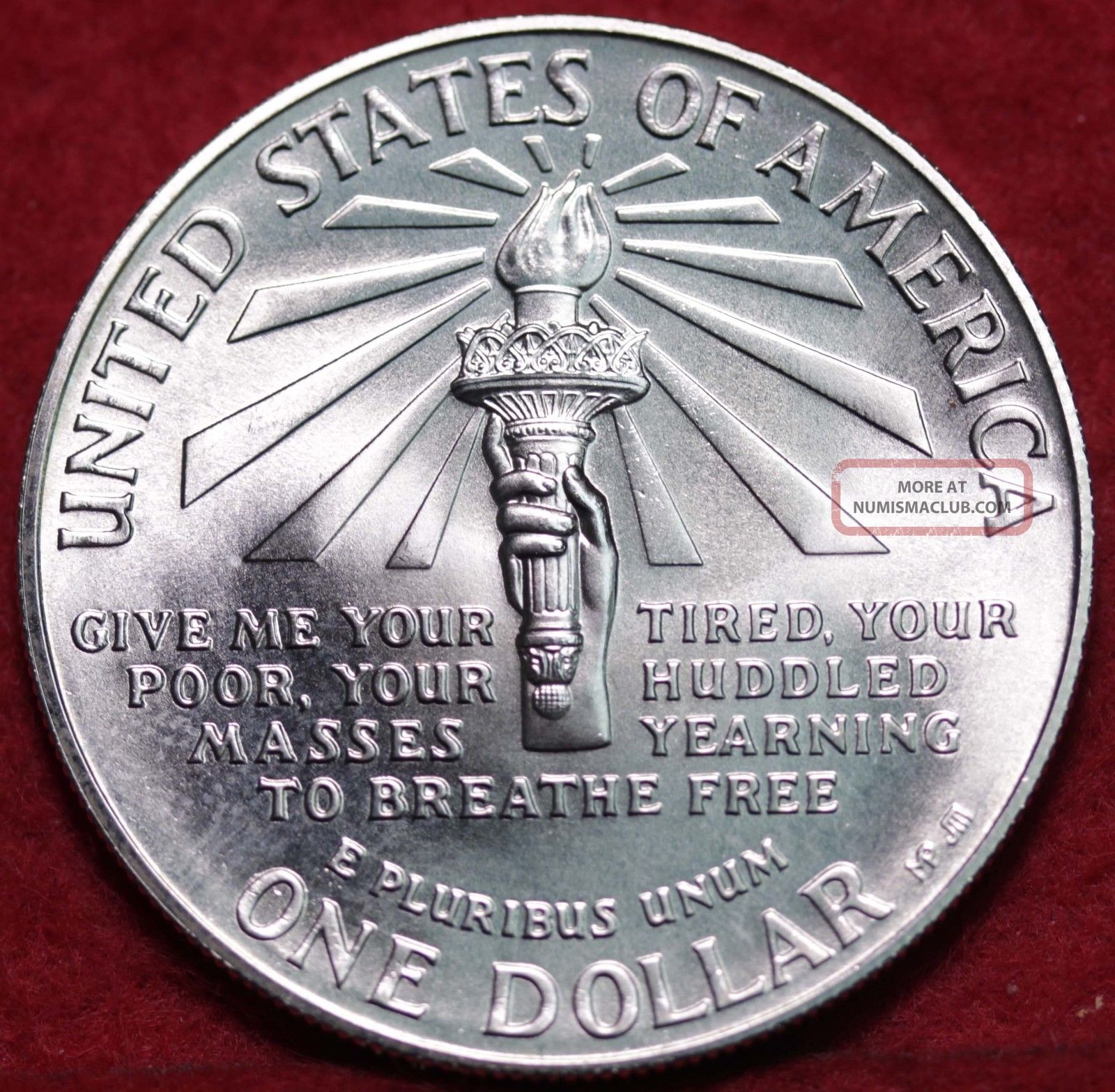 ellis island one dollar liberty coin value 1986