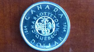1964 Brilliant Canadian Silver Dollar.  800 photo