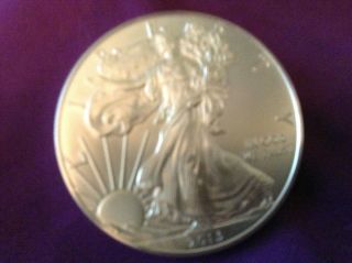 2013 1 Oz American Silver Eagle Coin.  999 Fine Silver E10 photo