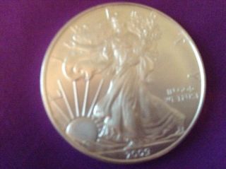 2009 1 Oz American Silver Eagle Coin.  999 Fine Silver E11 photo