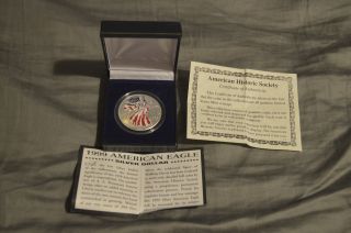 1999 American Eagle Silver Dollar With Colorization,  Box,  And Certificate. photo