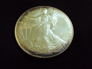 Coinhunters - 1999 American Silver Eagle - State - Toned photo