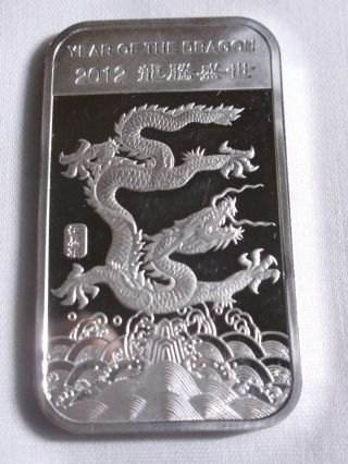 1 Oz Year Of The Dragon Silver Bar.  999 Pure Silver photo