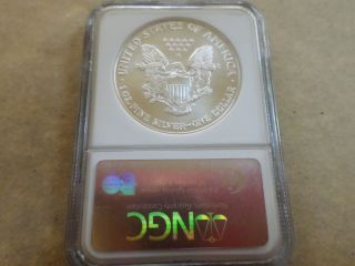2006 Ngc,  First Strikes,  American Eagle Dollar,  Gem Uncirculated. . . . . . . .  Look photo