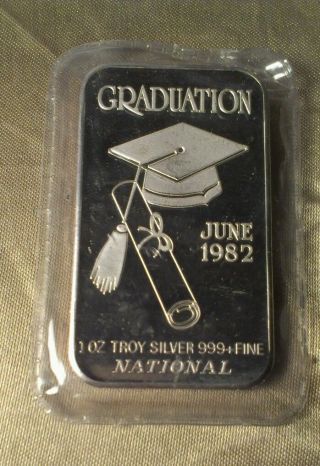 1982 June - Graduation - 1 Ounce.  999 Silver Bar - photo