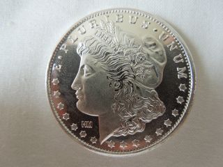 1 - 1 Oz.  999 Fine Silver Round - Morgan Dollar Design With Reeded Edges - photo