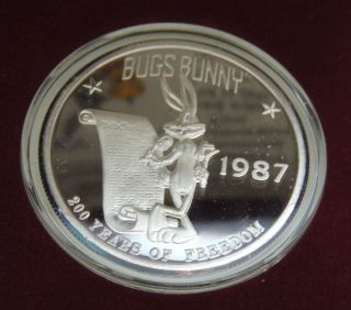 Looney Tunes 1987 Bugs Bunny Silver Round 1 Troy Oz.  999 Fine Silver Coin photo