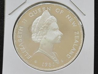 1981 Elizabeth Ii Zealand Commemorative One Dollar Silver Art Round C8366l photo